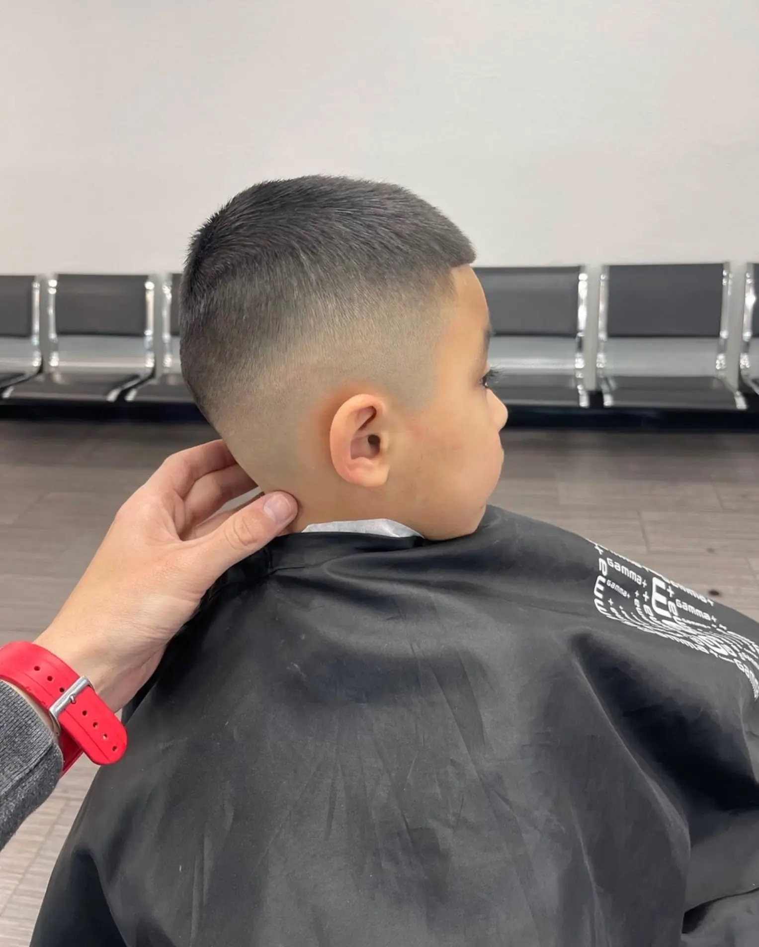 Mohawk fade with a detailed lightning and star razor design